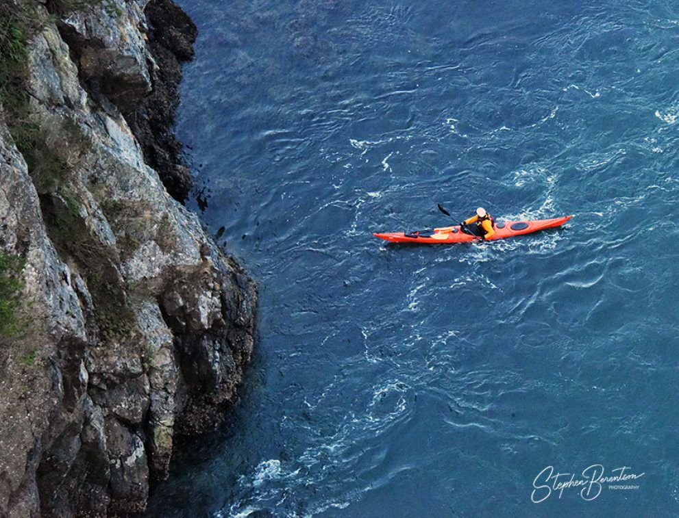 Kayaker, Pass Island bluff